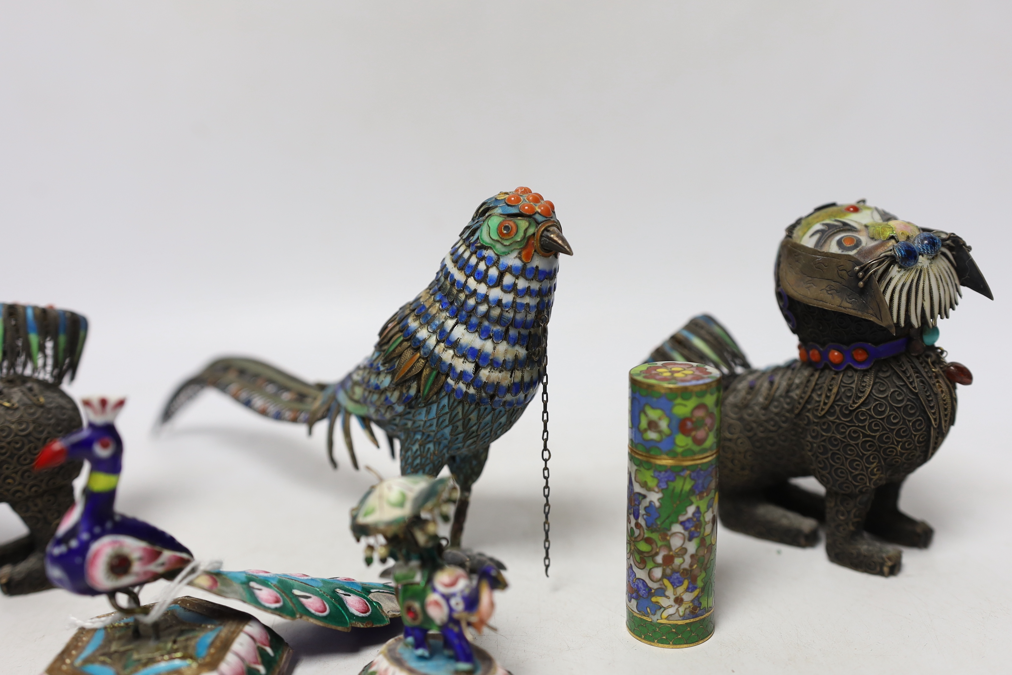 A Chinese white metal enamel pheasant, two similar lions, a cloisonné enamel pot and two Indian enamel figures